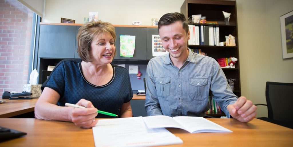 Career Services counselor advises Pacific student.