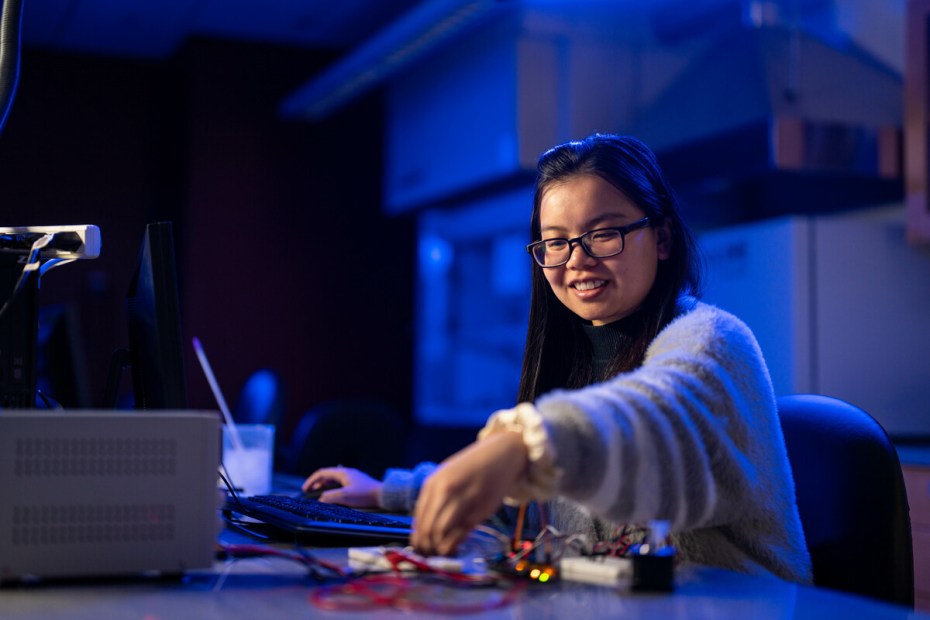 Jenny, Vo, bioengineering major, works on a project in lab.