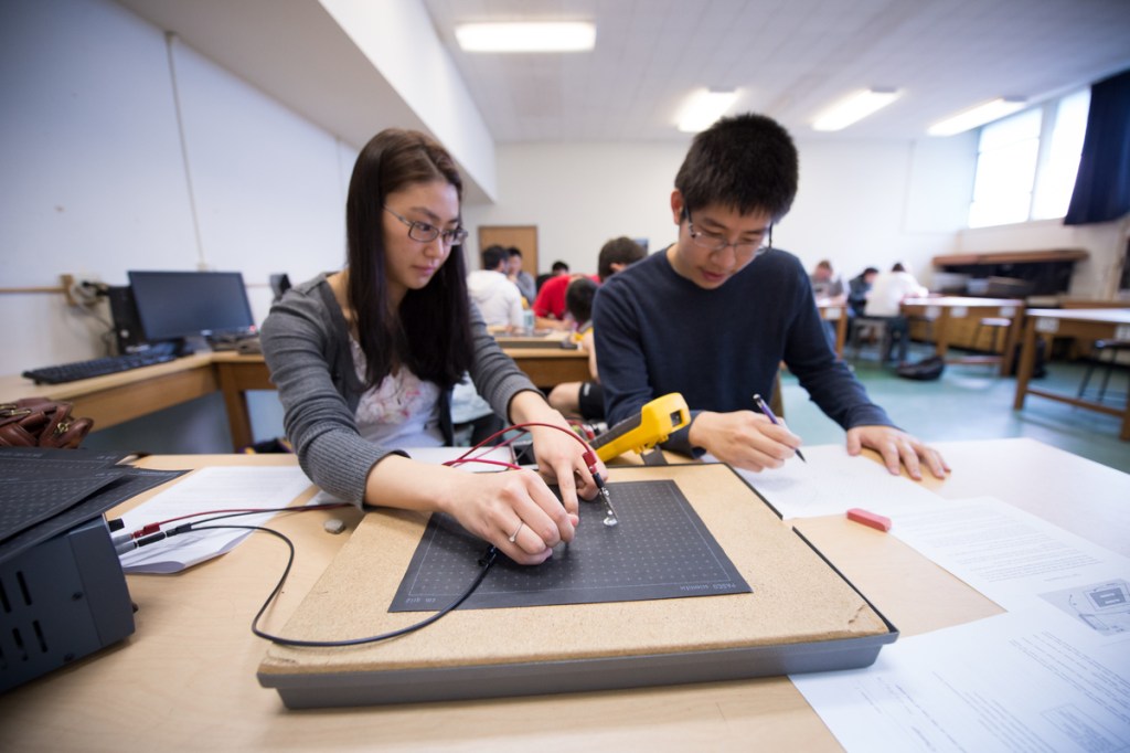 University of the Pacific physics students in the physics lab.